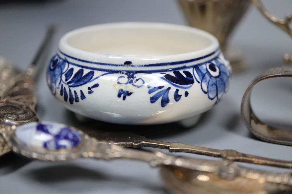 A silver sugar bowl and cream jug, a pair of nut dishes and sundry small silver